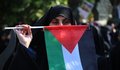 Moteris su Palestinos vėliava (nuotr. SCANPIX)