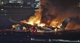 Katastrofa Japonijoje: susidūrus lėktuvams žūčių išvengti nepavyko (nuotr. SCANPIX)