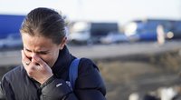 Moteris verkia palikusi Ukrainą (nuotr. SCANPIX)