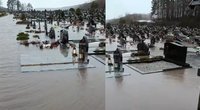 Potvynis Kartenoje: užsemtos kapinės (nuotraukos iš M. Meškausko transliacijos)  