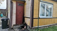Panevėžyje apdegė padegtos namo lauko durys (nuotr. tv3.lt)