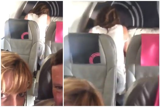 Šokiruojantis reginys lėktuve: įsiaudrinusi porelė mylėjosi prie keleivių (nuotr. Twitter)
