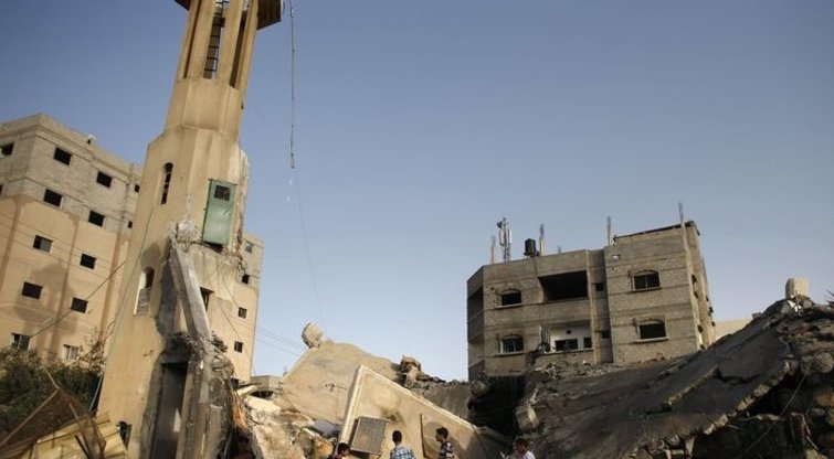 Gazos Ruože prasidėjus penktajai Izraelio smūgių dienai, žuvusiųjų skaičius išaugo iki 121 (nuotr. AFP/Scanpix)  