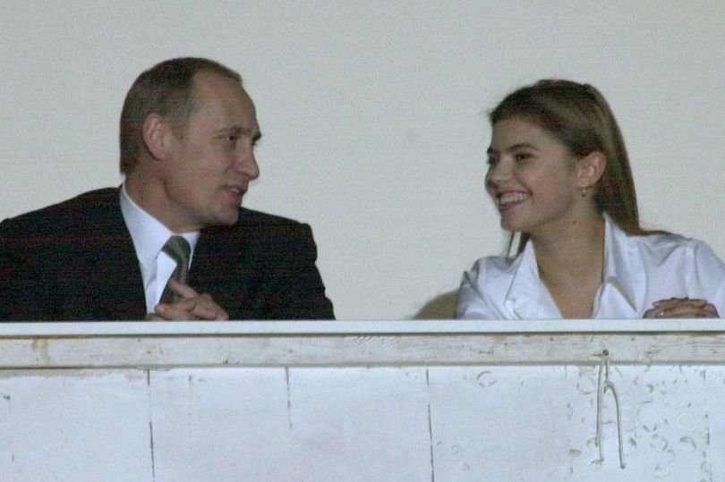Alina Kabajeva ir Vladimiras Putinas (nuotr. Getty images) 